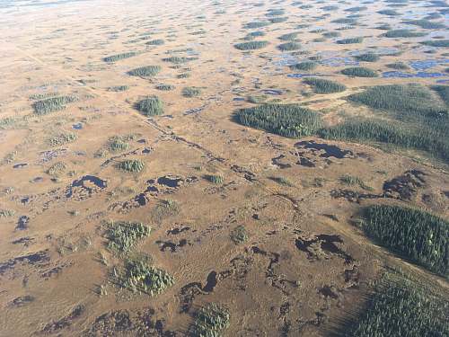 alexander lake aerial photography of land mass during daytime brown